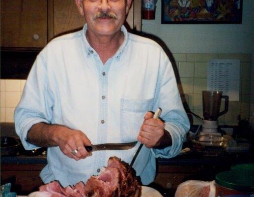 Roger Allen carving turkey, 1990s
